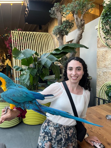 Lina with a parrot
